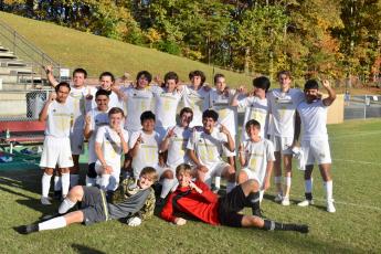 (Karen Dudley • Submitted)  Hayesville’s men’s soccer team celebrate their SMC championship after their win over Swain. First row, from left, Connor Rexroad and Kylan Bunch. Second row, Jose Constantino, Je erson Hernandez, Will Gordon, Javier Bustamante, Lee Anderson, Ayeden Richbourg and Blake Owens.Third row, Anthony Ashley, Isaiah Michael, Jacob Rogers, Mason Norris, Jared Welch, Zane Lucksavage, David Green, Ryelan Snowden and Omar Fonceca.