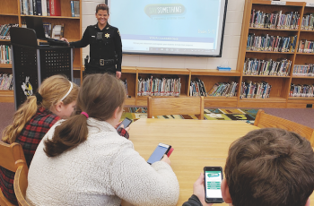 Clay County Sheriff’s Office School Resource Officer and District Training Coordinator Melissa Mariano trained Clay County Schools students about the Say Something Anonymous Reporting App. The student in the foreground has the app open on his phone.
