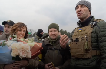 Ukrainian bride, Lesia Ivashchenko and groom Valerii Fylymonov marry in battle gear in a ceremony aired on YouTube, just before they fight to defend their hometown.