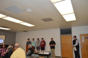 Marcia Barnes • Clay County Progress Taylor McClure, Logan Caldwell, Ethan Hooper, Kyle Lunsford were recognized at the school board meeting for their athletic achievements by Coach Chad McClure.
