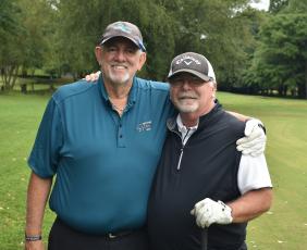 Golf, fellowship and fun for a good cause is the name of the game for Jose Arias and Dr. Jim Redmond.