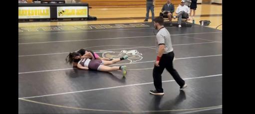 Amyna catching her opponent in a cow catcher right before pinning her opponent.