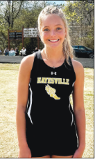 Ella Matheson broke the 1998 school record in the triple jump with a jump of 35'7."